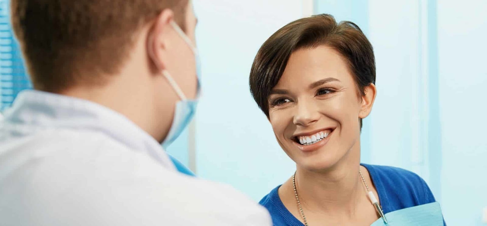 A patient smiling during a conversation with a clinician