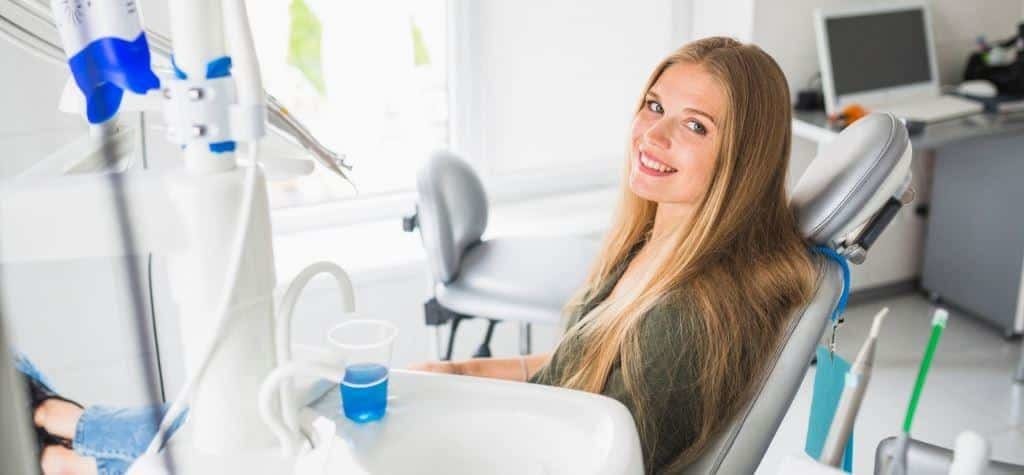 A patient sitting in a dental chair