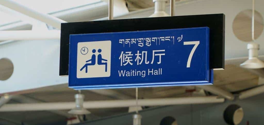 People sitting in an airport waiting area