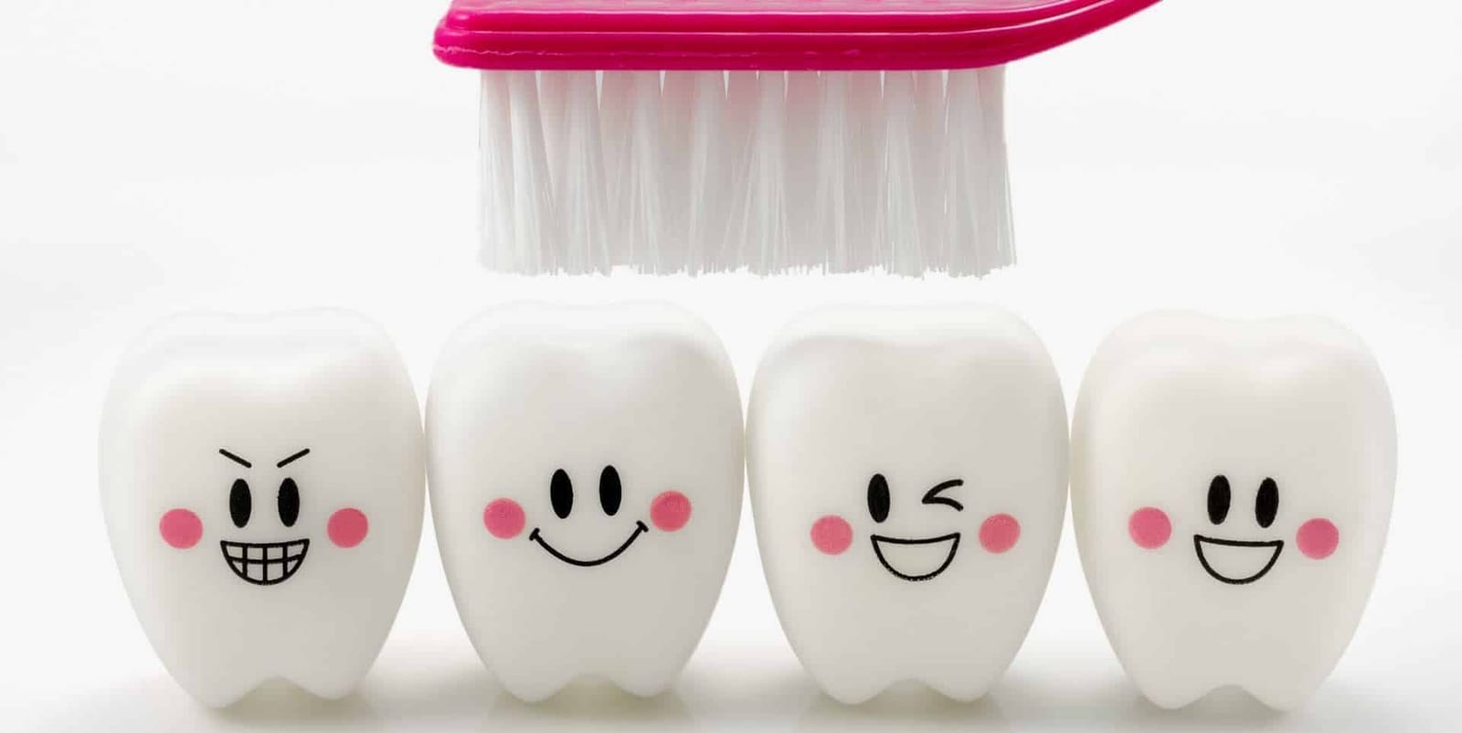 Cartoon teeth and a toothbrush.