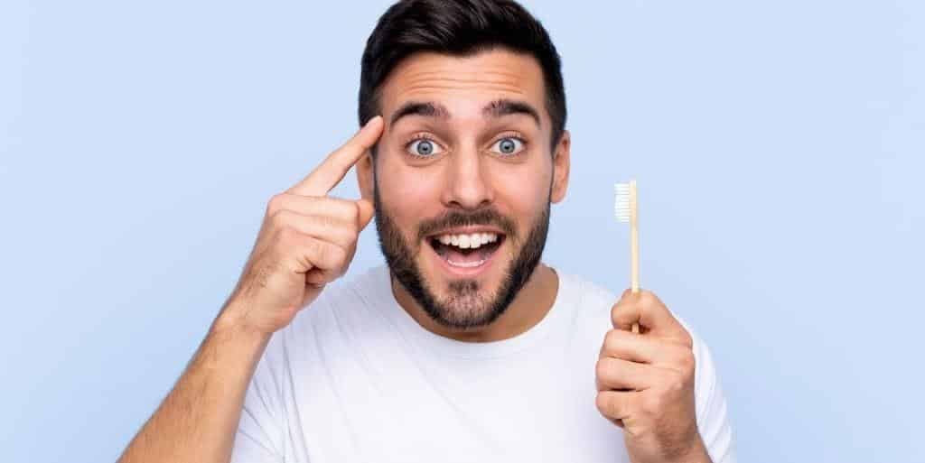 Man holding a toothbrush