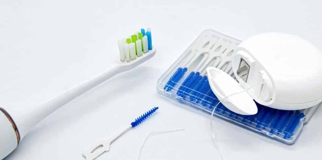 A toothbrush, floss and interdental brushes