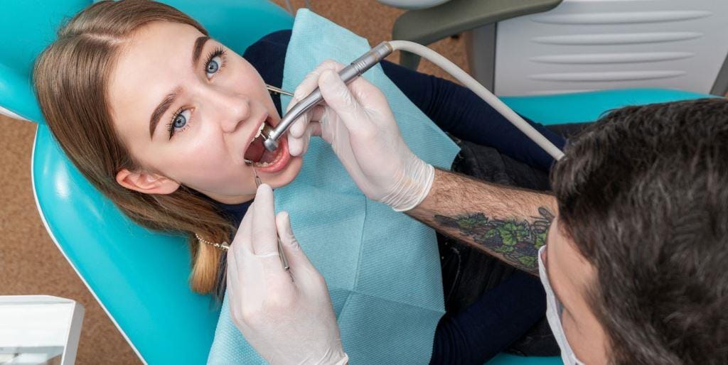 A patient receiving dental treatment
