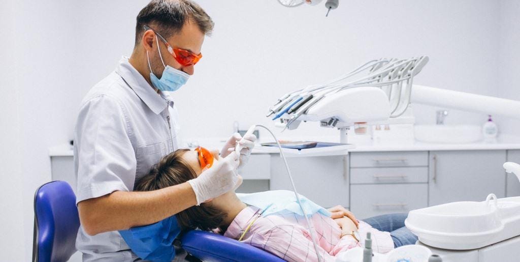 A patient receiving dental treatment