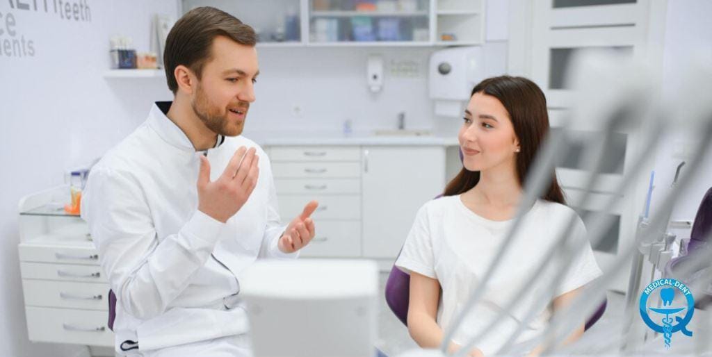 Dentist talking with a patient during a consultation