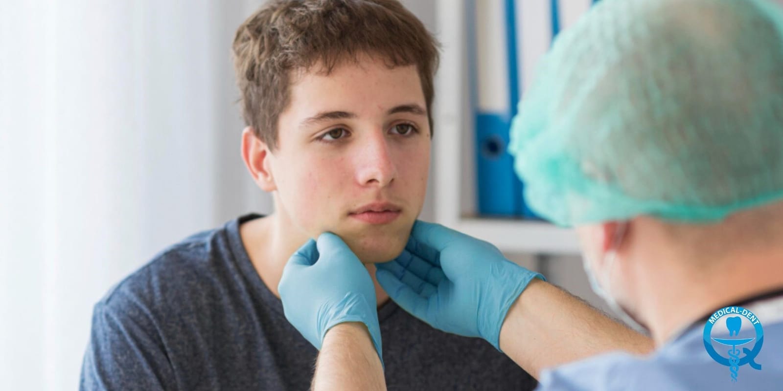 A clinician examining a young patient’s jaw position