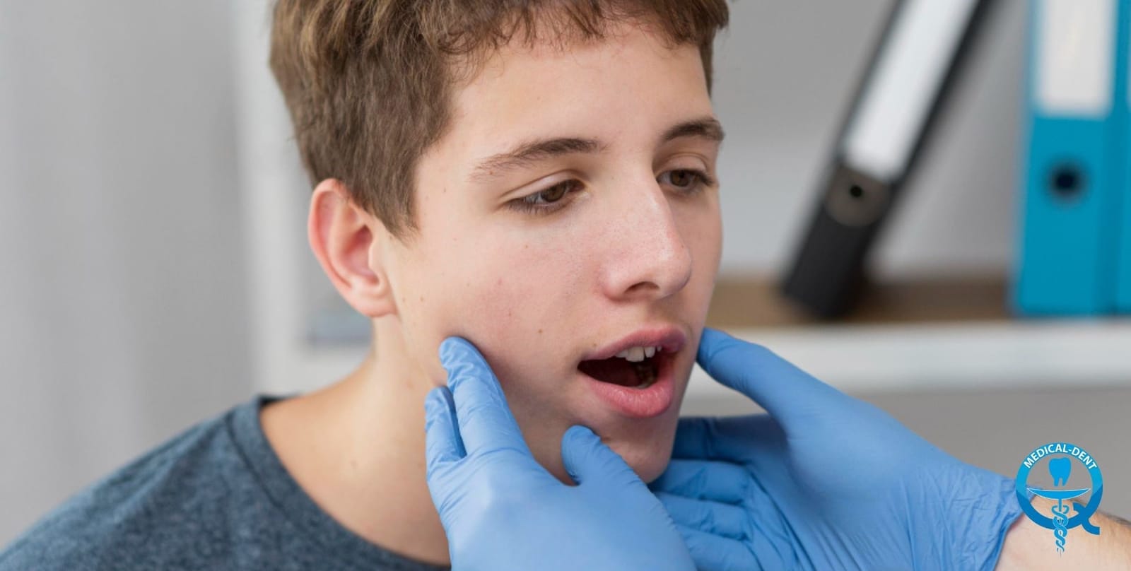 Dentist examining a child’s jaw and mouth