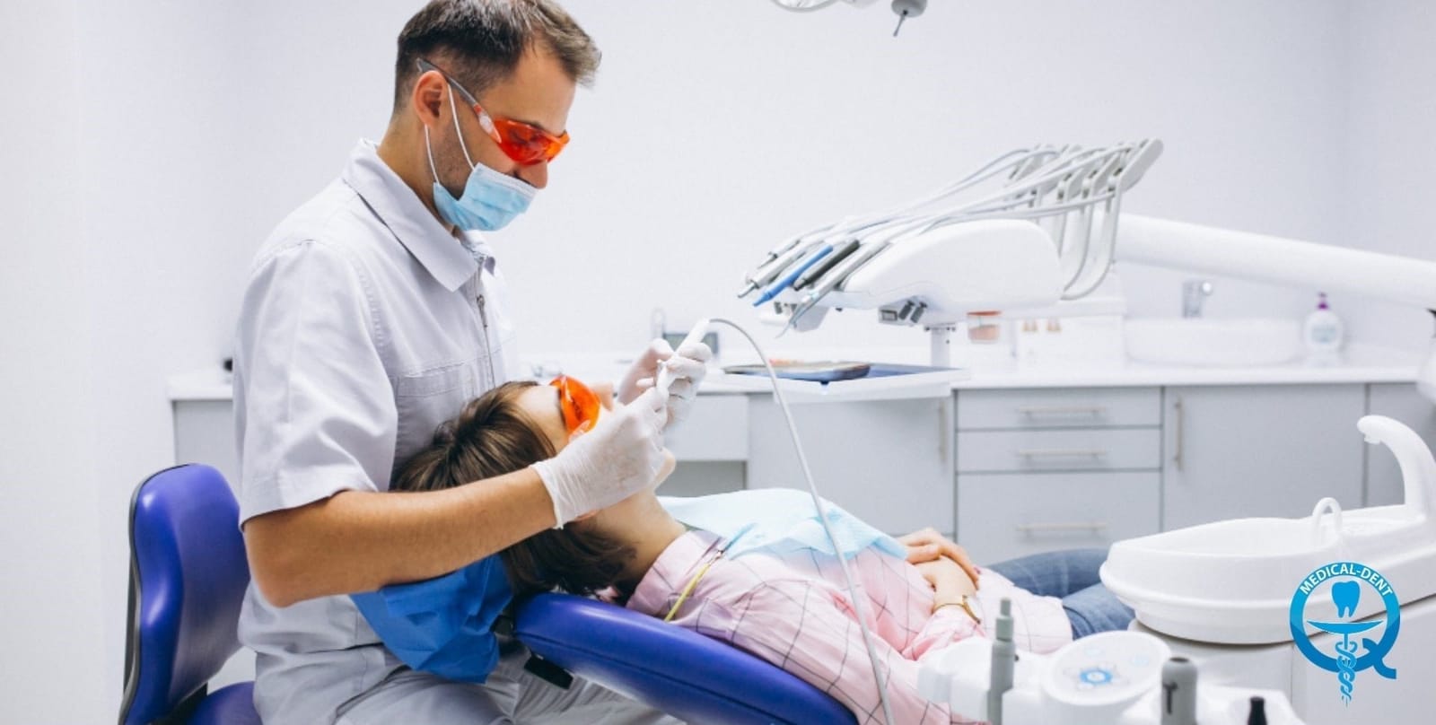 A clinician carrying out dental treatment