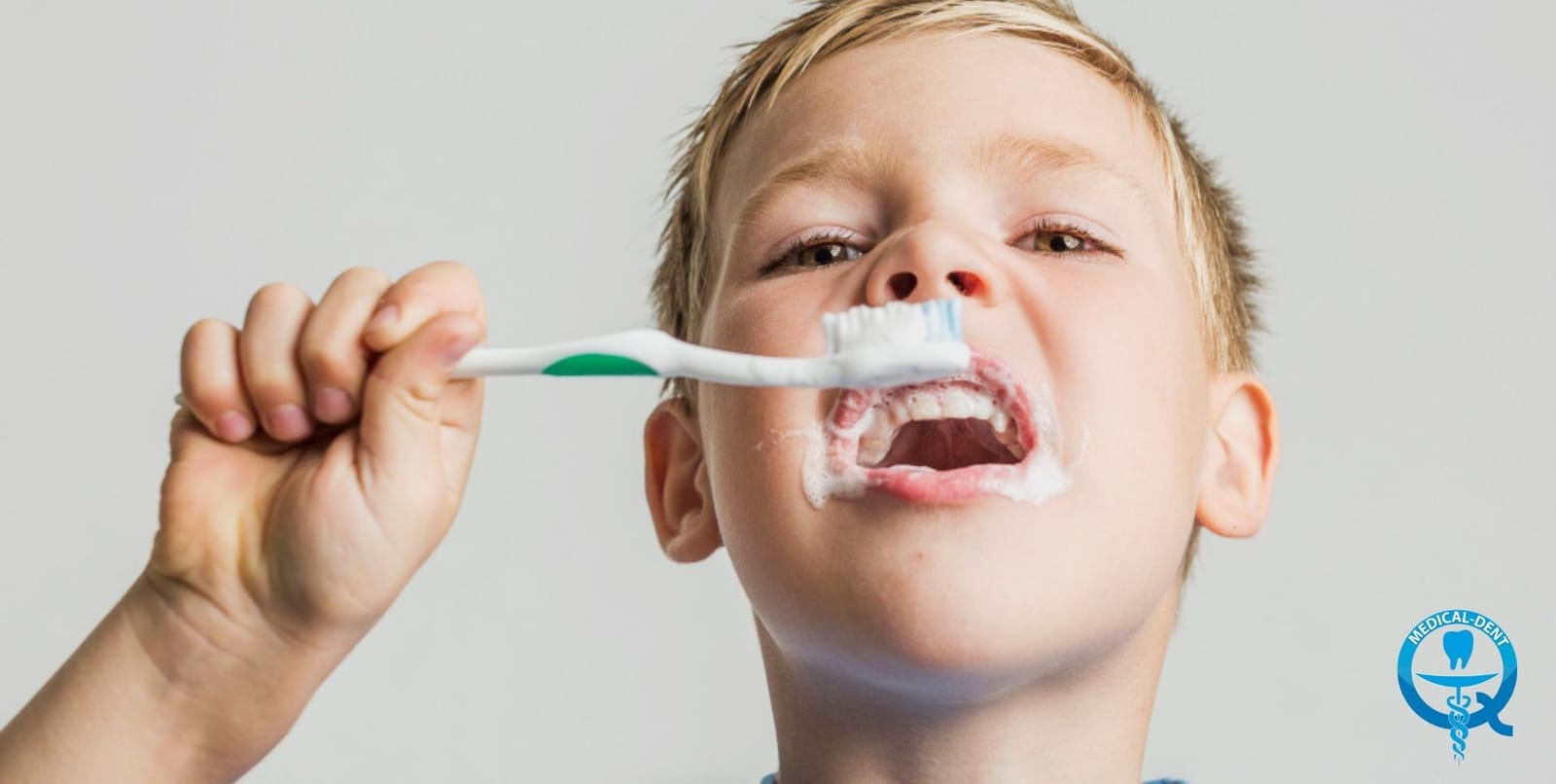 A child brushing their teeth
