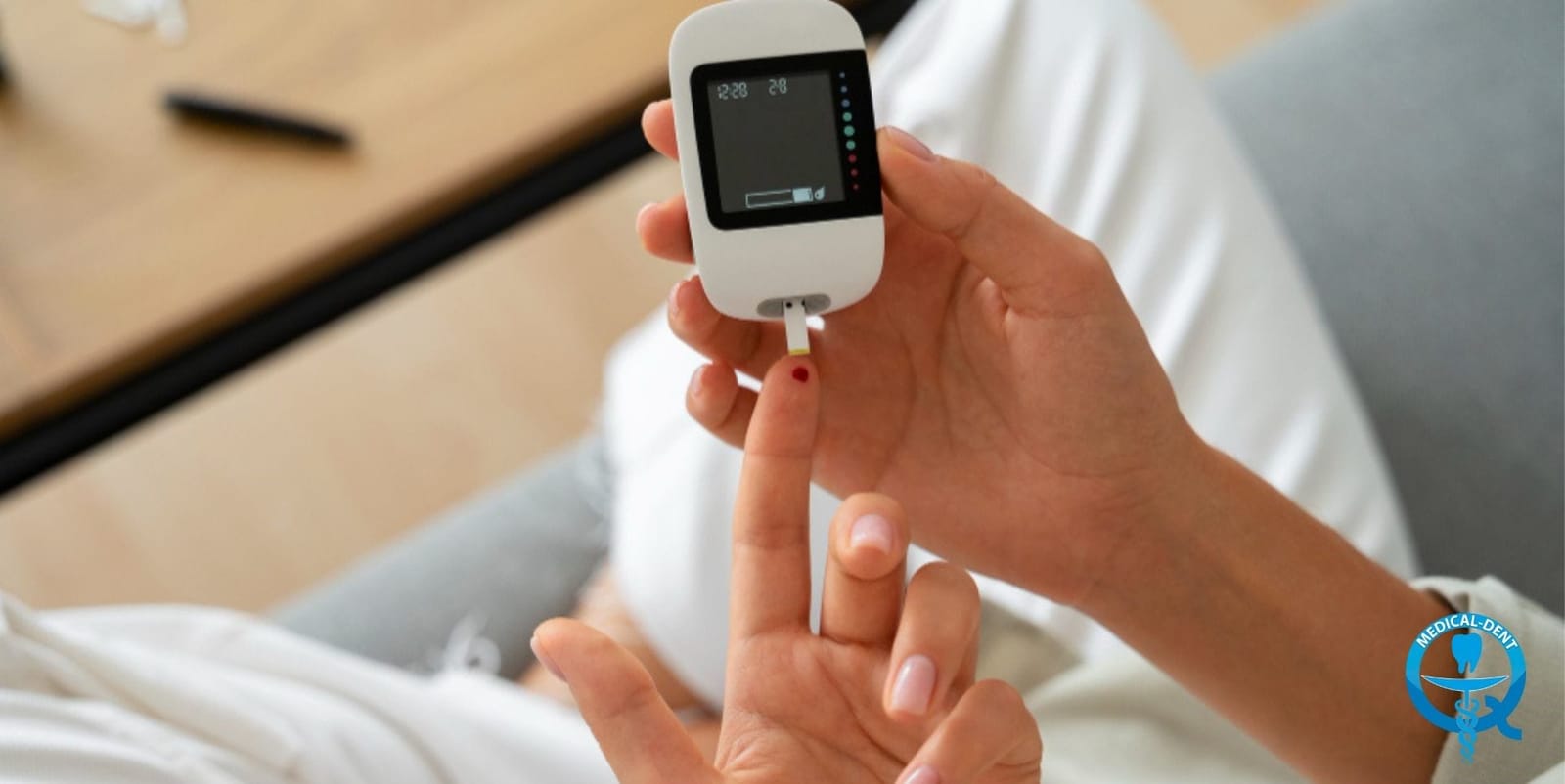 Blood glucose being checked with a finger-prick meter