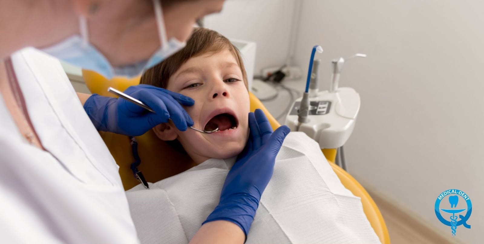 Dentist examining a child’s teeth