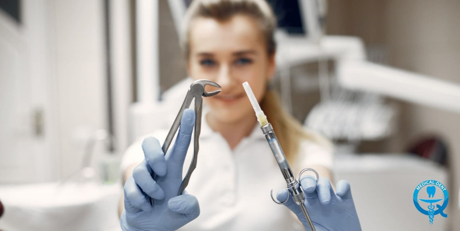 A clinician holding dental instruments