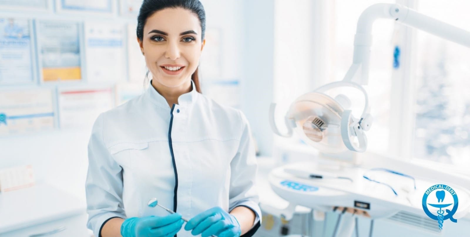 A clinician in dental clothing beside instruments