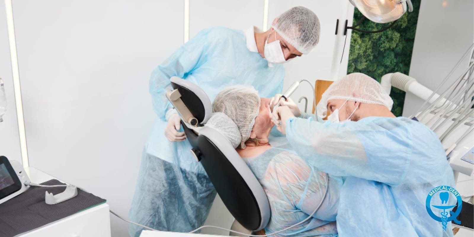 A dental team treating a patient
