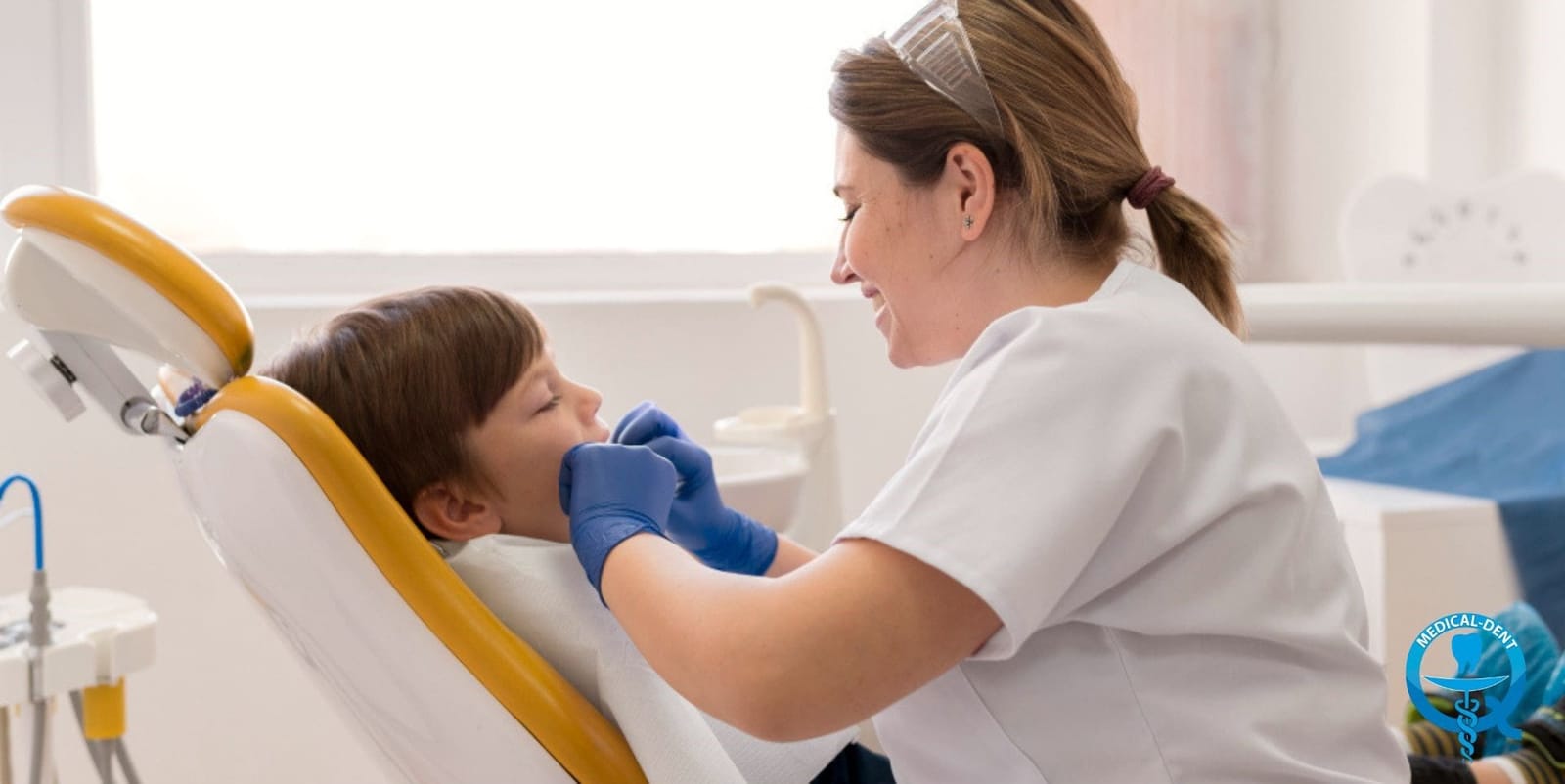 Dentist examining a child’s teeth