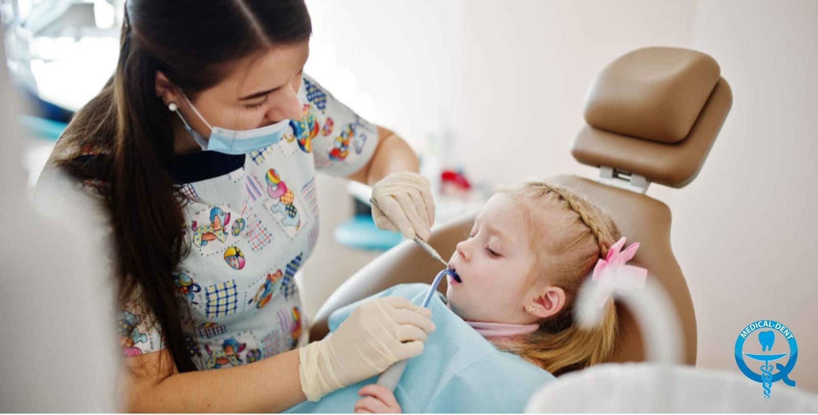Dentist examining a child reclining in a dental chair