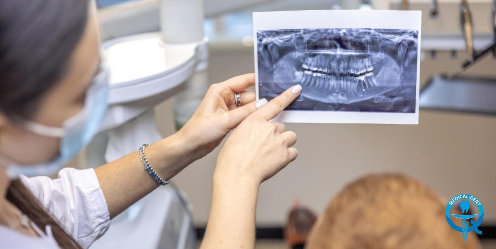 Panoramic dental X-ray displayed on a sheet