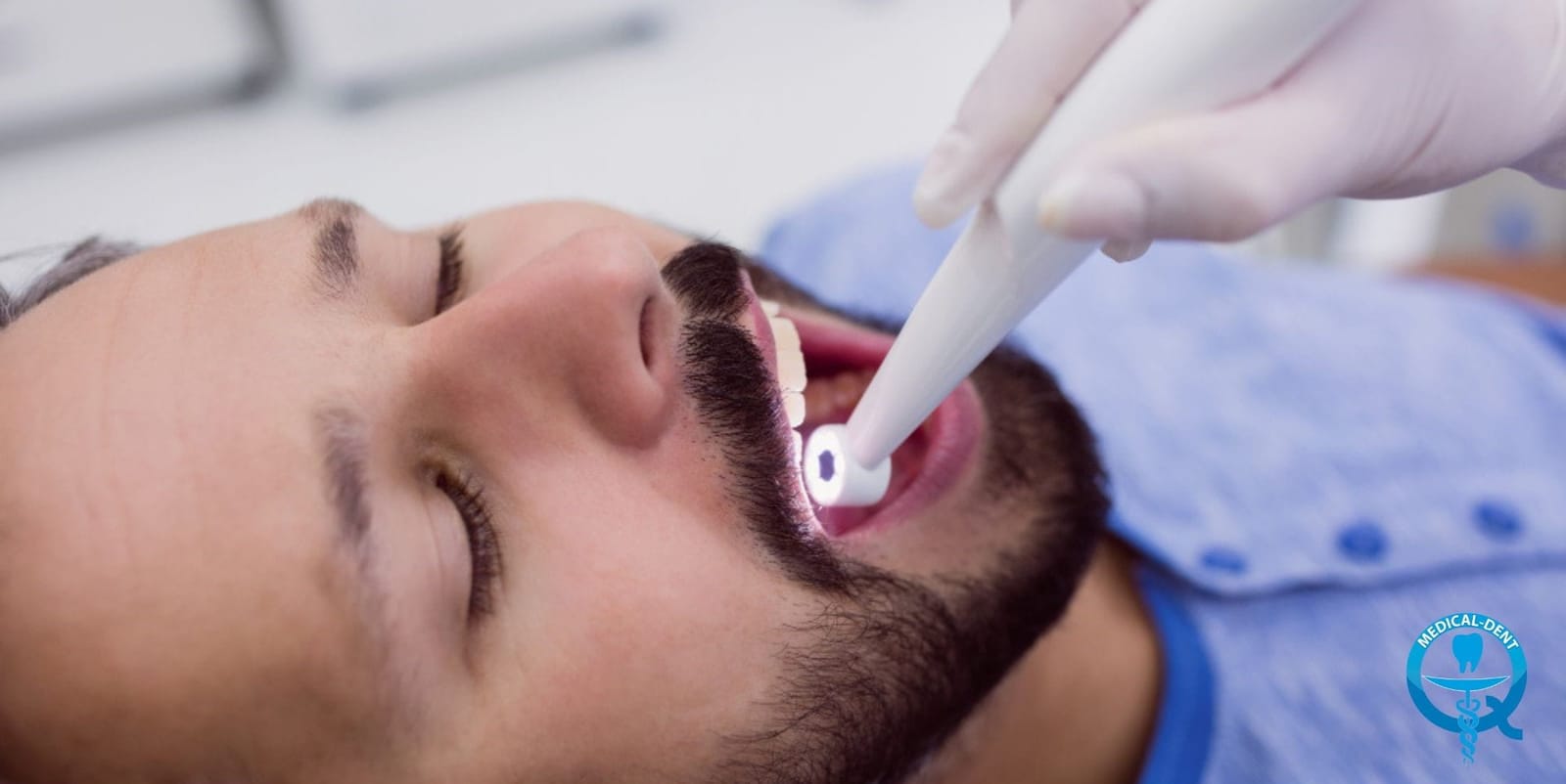 Dental instrument being used inside a patient’s mouth