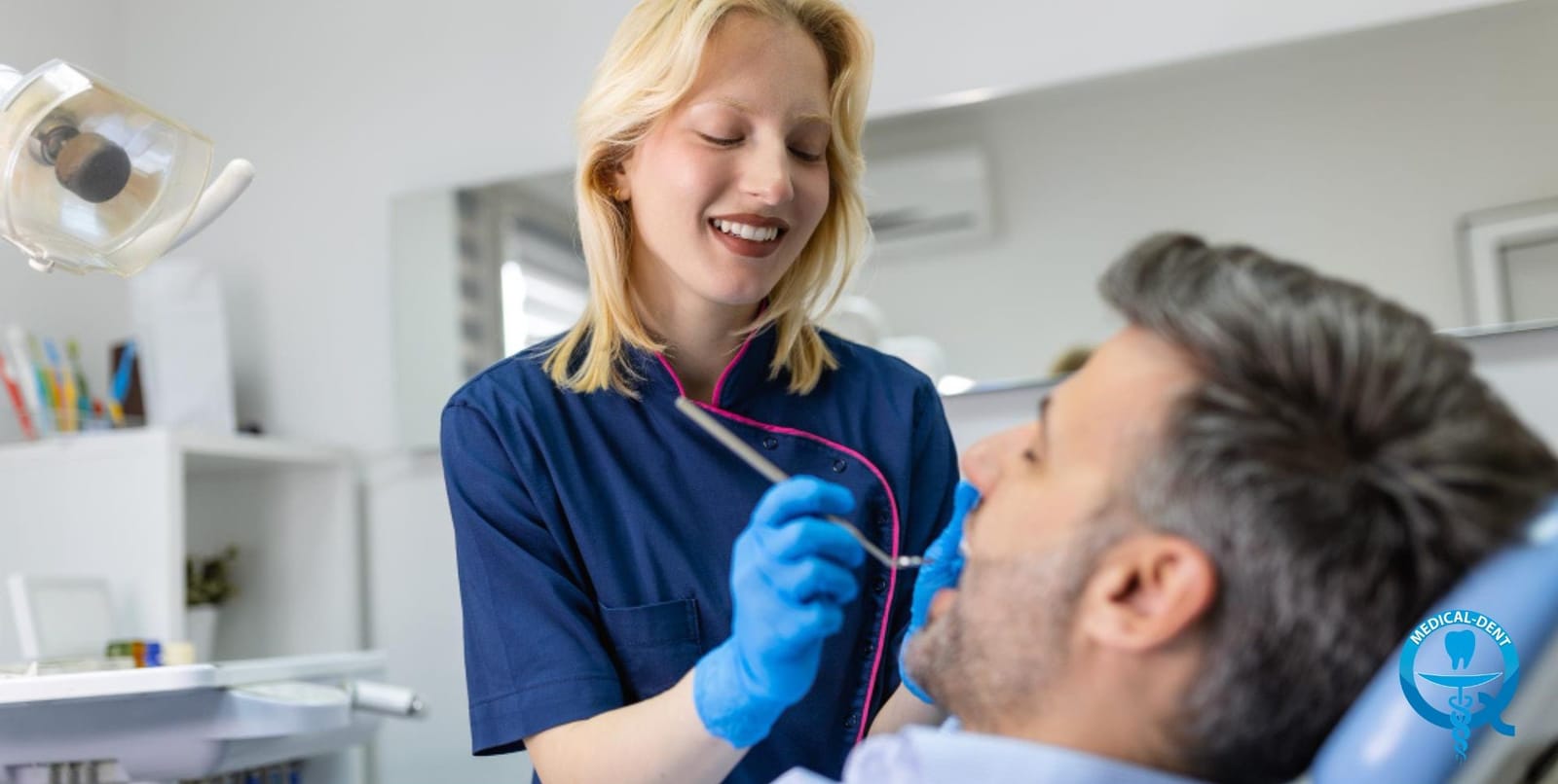 A clinician examining a patient’s teeth